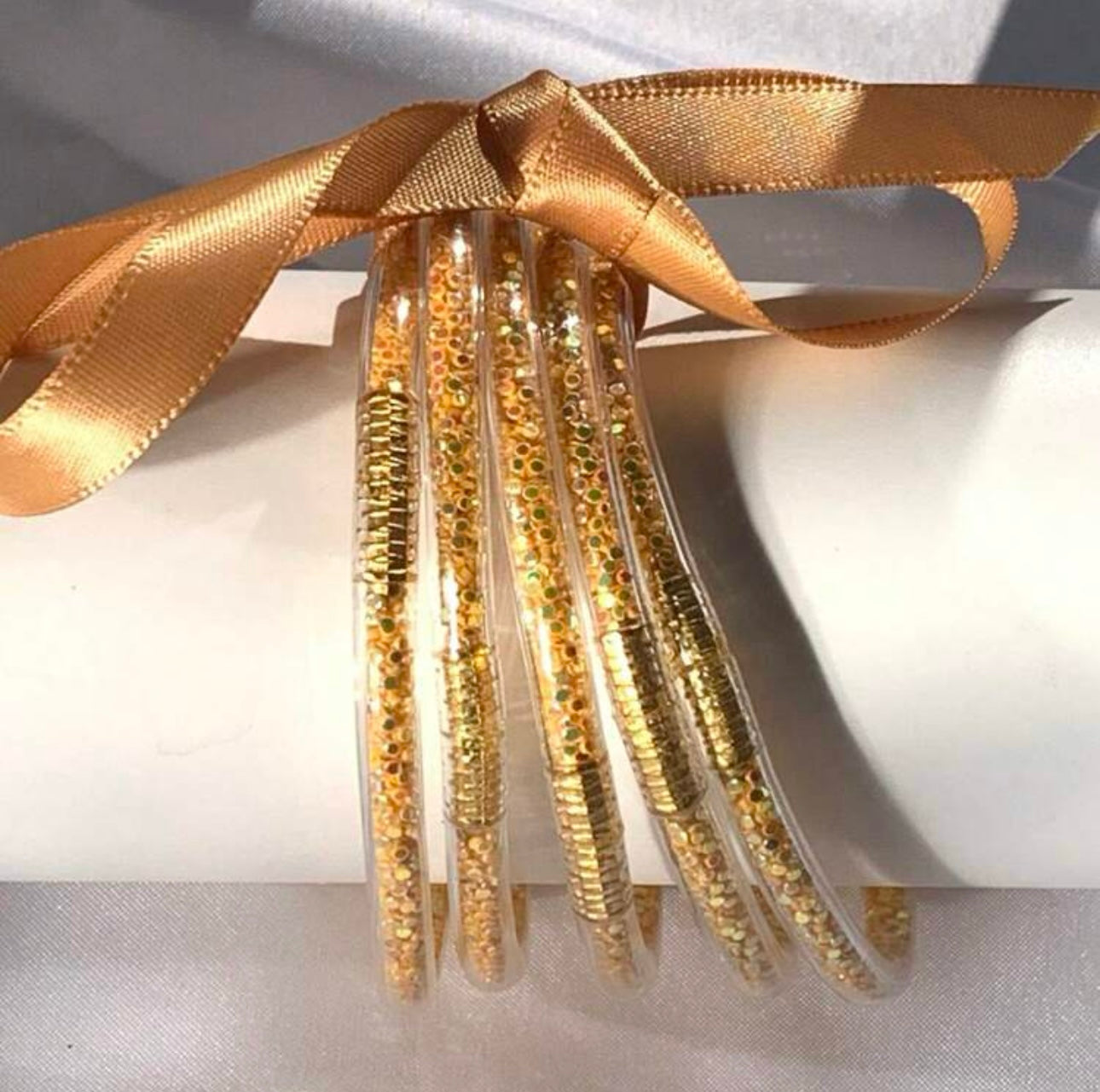 TRANSPARENT GLITTER BRACELETS - Main Image