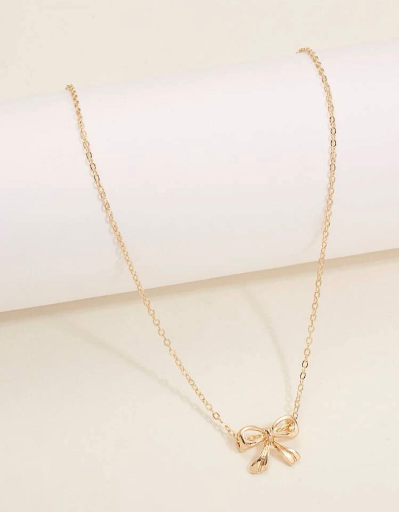 BOW CHARM NECKLACE